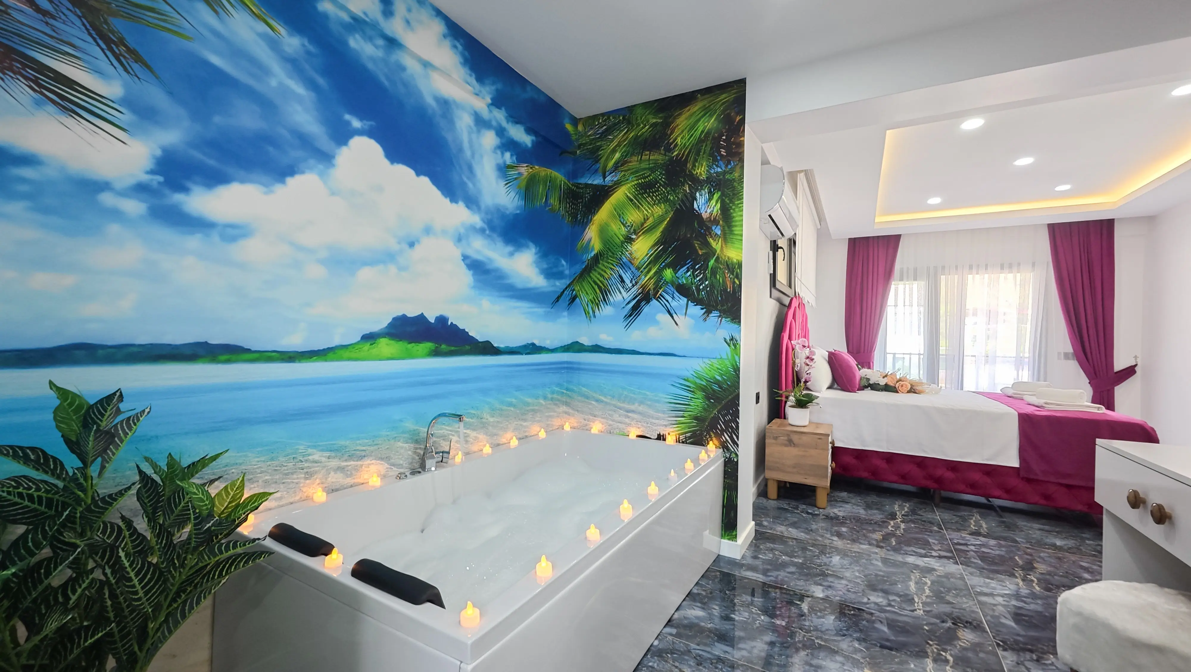 Pembe odada çift kişilik yatak